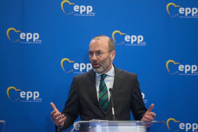 Manfred Weber, EPP President, speaking at a press conference against a blue EPP backdrop.