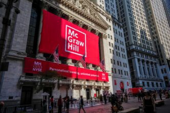 The New York Stock Exchange facade draped in a massive red banner promoting McGraw Hill's IPO.