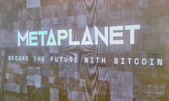 Digital display showing the Metaplanet logo and the slogan "Secure the Future with Bitcoin."