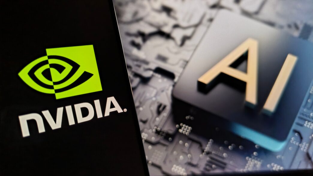 NVIDIA logo on a phone screen next to a physical block with "AI" letters on a circuit board.