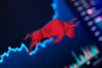 Red polygonal bull figure leaping across a dark blue digital screen with a rising financial line graph.