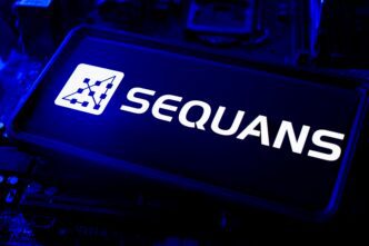 The Sequans logo and name are displayed on a blue-lit screen, resting on a dark computer circuit board.
