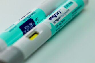 Close-up of two Wegovy (semaglutide) injection pens used for chronic obesity treatment.