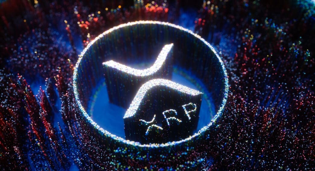 3D rendering of the XRP cryptocurrency logo glowing with vibrant red and blue digital particle effects.