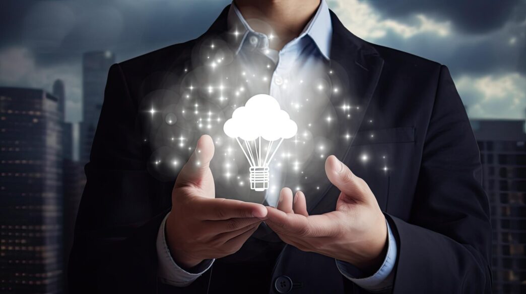 Businessman holding a lightbulb with a cloud icon, representing Generative AI technology.