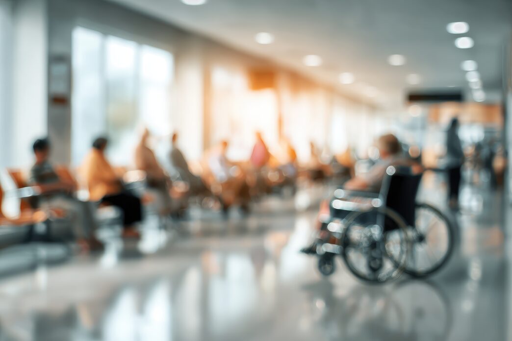 People seated in a hospital waiting area at HCA Florida.