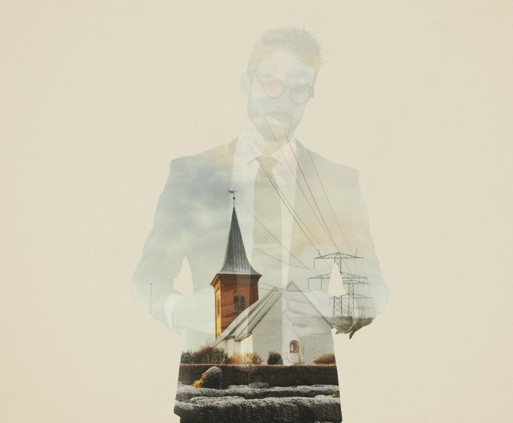 A man's face is overlaid with a cityscape, symbolizing career growth and urban development.