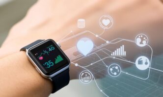 A smartwatch is on a person's wrist, likely monitoring their health.