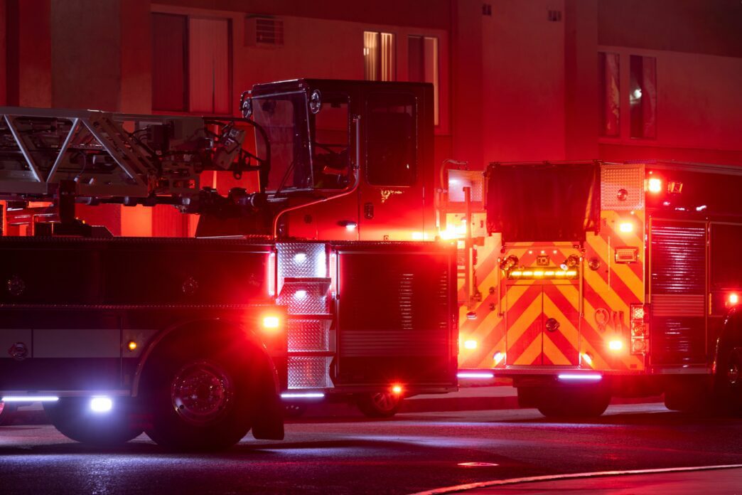 Fire engine responding to emergency scene at night in Moses Lake