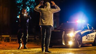 Law enforcement officers responding to an armed robbery in Manhattan.