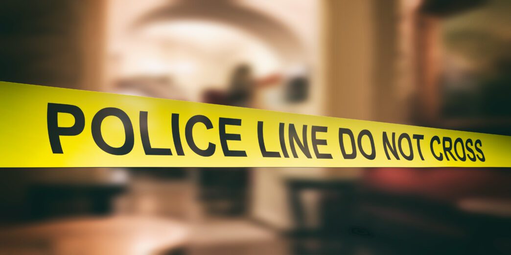 Law enforcement officers responding to a violent carjacking in Oakland.