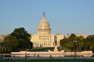 View of the historical Seat of Congress building against a clear sky.