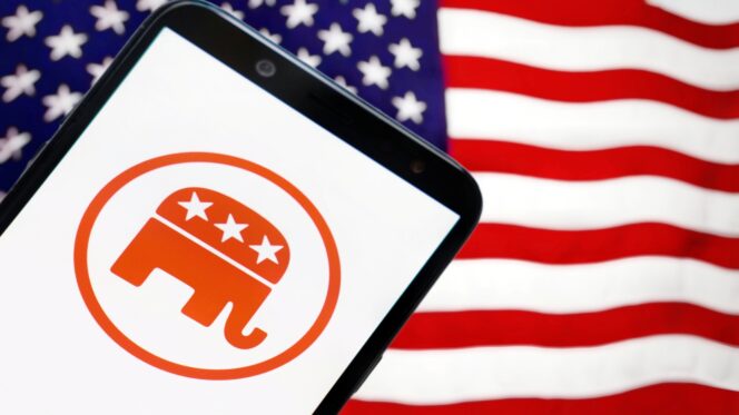Smartphone displaying Republican Party logo with American flag in the background.
