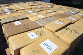 Seized illegal narcotics and drug paraphernalia from a law enforcement raid in Charlotte County.