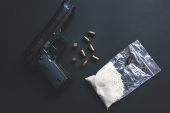 Drugs and weapons seized during a DEA fentanyl crackdown operation