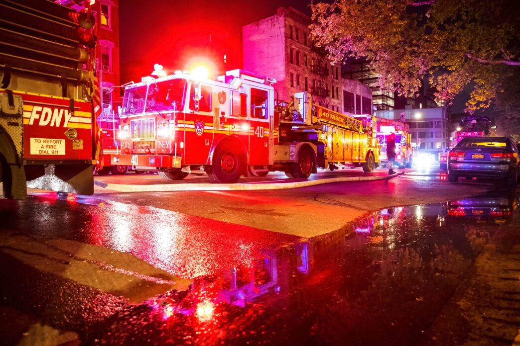 Emergency disaster scene showing aftermath of Mansfield train derailment.