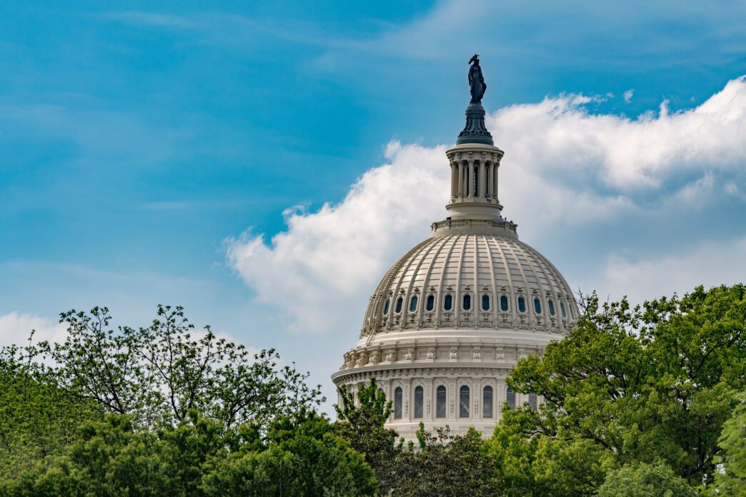 View of the Washington DC Capitol building under a cloudy sky