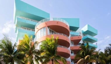 An impressive Art Deco building in pastel blue and pink papaya hues located in Miami Beach.