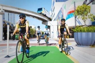 Cyclists in Downtown with the Metromover line in the background