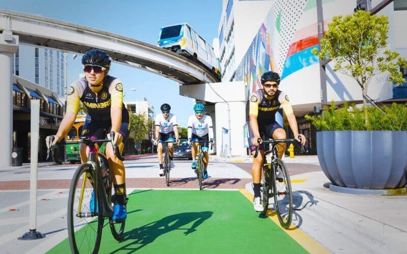 Cyclists in Downtown with the Metromover line in the background