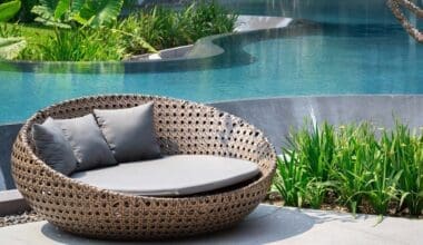 Relaxing Rattan Sofa At Swimming Pool