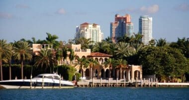 Luxurious waterfront home in South Beach with the Portofino Tower as a backdrop