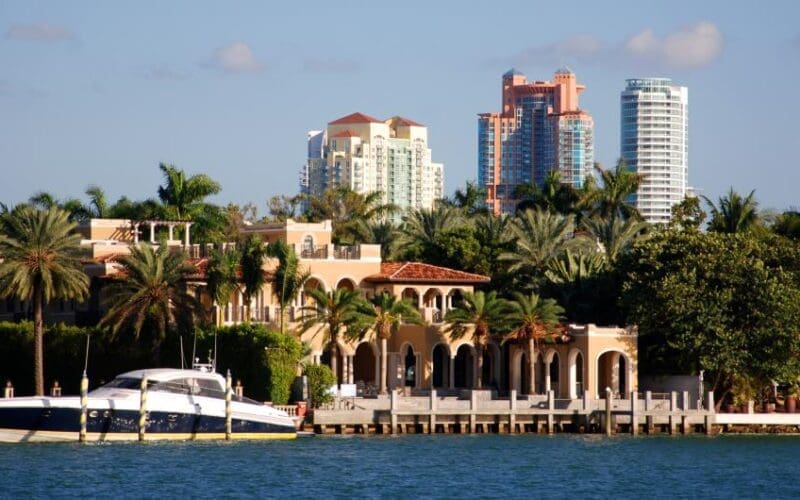 Luxurious waterfront home in South Beach with the Portofino Tower as a backdrop