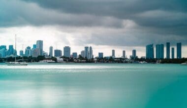 Beautiful view of tall buildings and boats on a cloudy day in South Beach