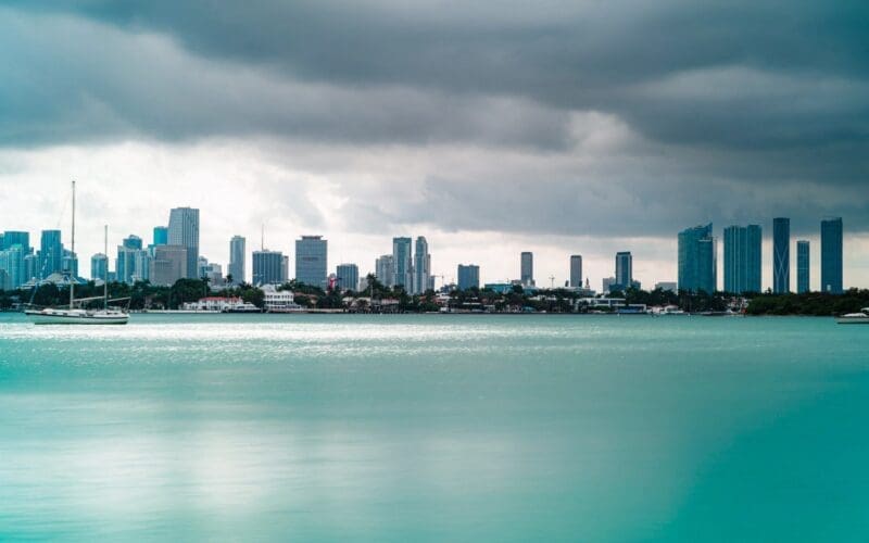 Beautiful view of tall buildings and boats on a cloudy day in South Beach